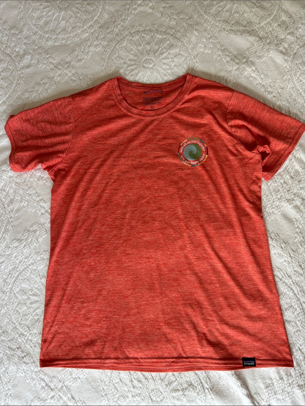Patagonia Women’s Capilene Cool Daily Orange Heather Short Sleeve Graphic Tee